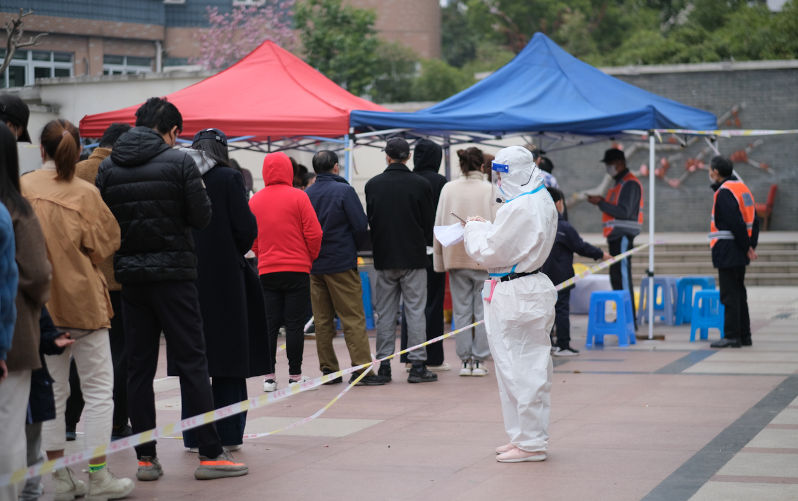 Chinese people line up to receive nucleic acid test for Covid-19 coronavirus at local community. Shanghai covid-19 Omicron