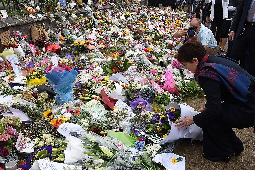 Patsy Reddy laying flowers at the Christchurch Botanic Gardens on 19 March.