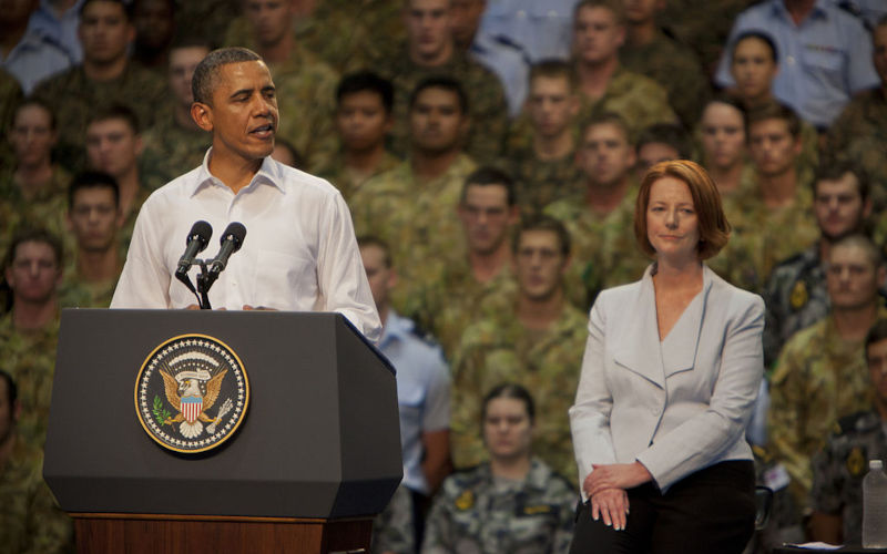 U.S. President Barack Obama, left, speaks in honor of 60 years of the U.S.-Australian alliance Nov. 17, 2011, in Darwin, Australia, as Australian Prime Minister Julia Gillard, right, looks on.