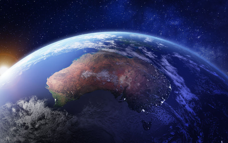 Australia from space at night with city lights of Sydney, Melbourne and Brisbane, view of Oceania,