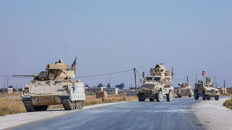 M2A2 Bradley IFVs of the 4th Battalion, 118th Infantry Regiment, attached to 218th MEB, accompany a U.S. patrol in eastern Syria, 13 November 2019