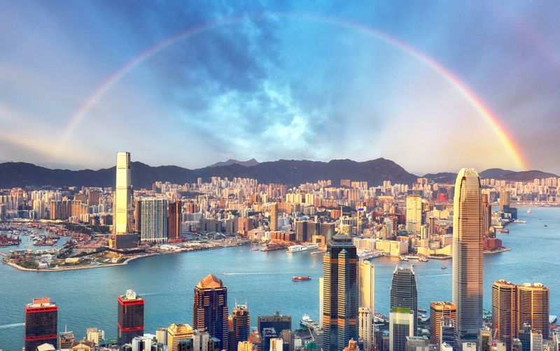 Rainbow over Hong Kong city skyline.