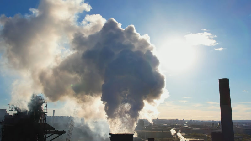 Smoke-moving-and-blocking-sunset,-light-leaks-flickering. Image: iStock Smoke moving and blocking sunset, light leaks flickering.