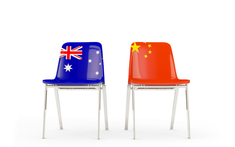 Two chairs with flags of Australia and china isolated on white. Communication/dialog concept.