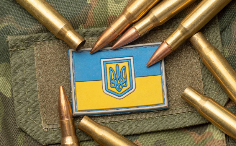 combat bullets on the background of the Ukrainian flag.