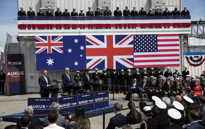 epa10521428 (L-R) Australian Prime Minister Anthony Albanese, US President Joe Biden and United Kingdom Prime Minister Rishi Sunak hold a press conference at the Naval Base Point Miramar in San Diego, California, USA, 13 March 2023. The three leaders announced that Australia will purchase nuclear-powered attack submarines from the U.S. EPA/ETIENNE LAURENT