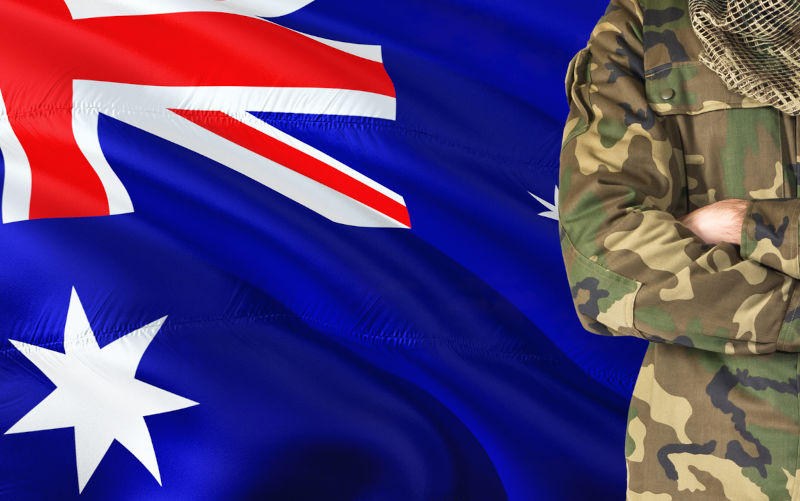 Australian soldier with national flag.