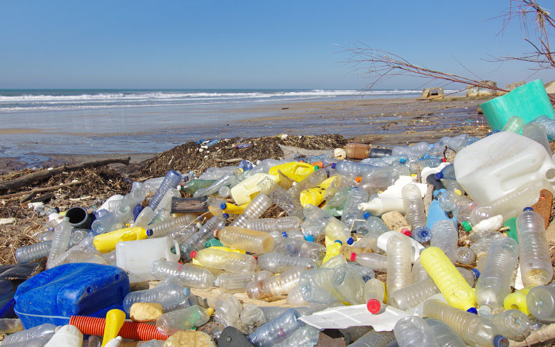 Garbages, plastic, and wastes on the beach after winter storms. Atlantic west coast of France.