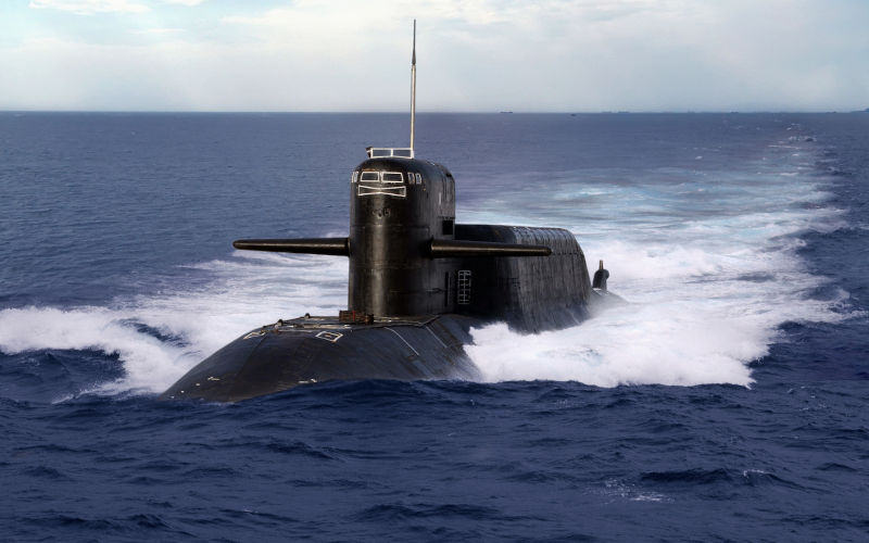 Navel nuclear submarine cruising on open sea.