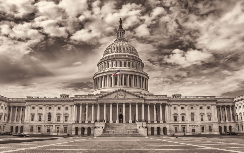 Wide angle view of the plaza area of the U.S. Capitol East Front Facade in Sepia tone.