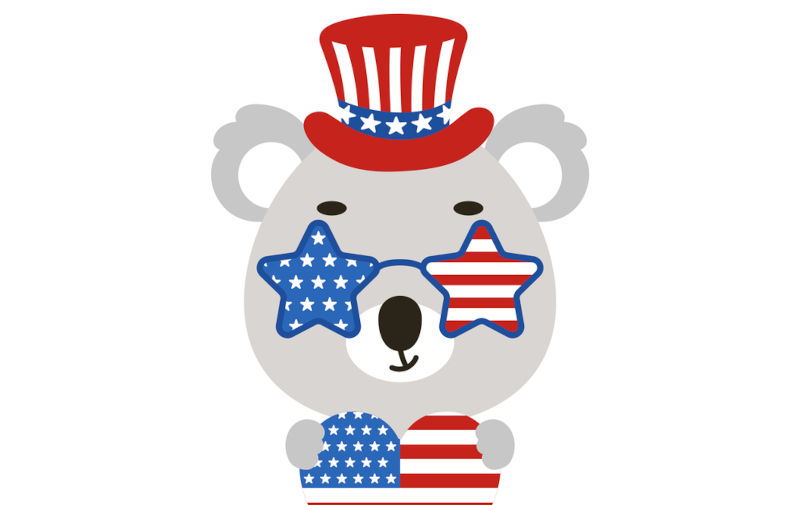 Cute little koala holding heart in USA patriotic hat and glasses.