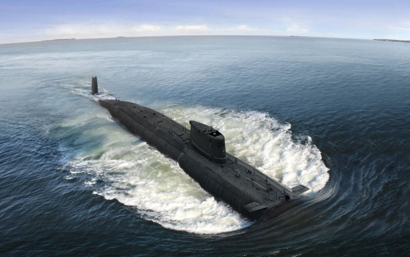 Naval submarine on open sea surface with cloudy blue sky