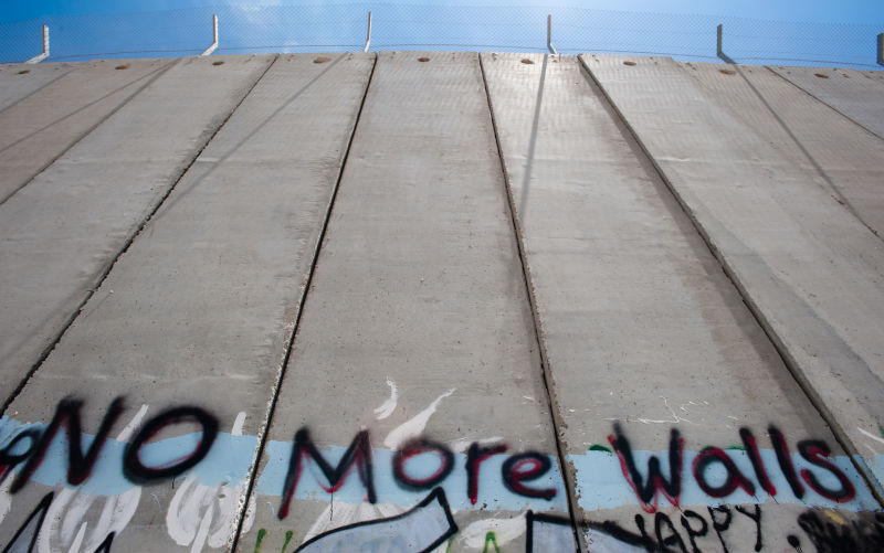 BETHLEHEM, OCCUPIED PALESTINIAN TERRITORIES - Activist graffiti adorns the Israeli separation wall in the West Bank town of Bethlehem.