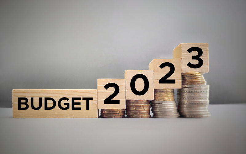 Budget 2023 text on wooden blocks in vintage background.