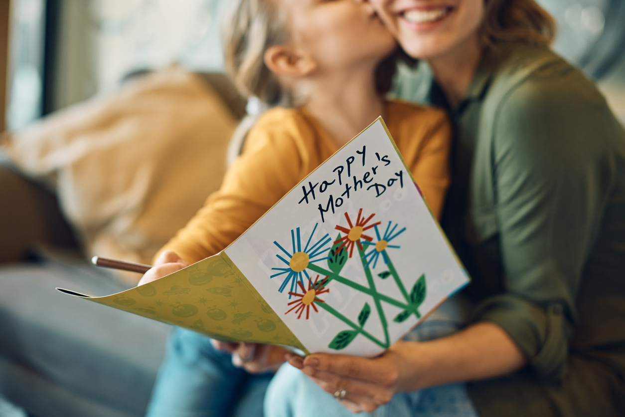 Close-up-of-woman-receiving-Mother’s-day-greeting-card-from-her-daughter. Image: iStock Close-up of woman receiving greeting card from her daughter on Mother's day.