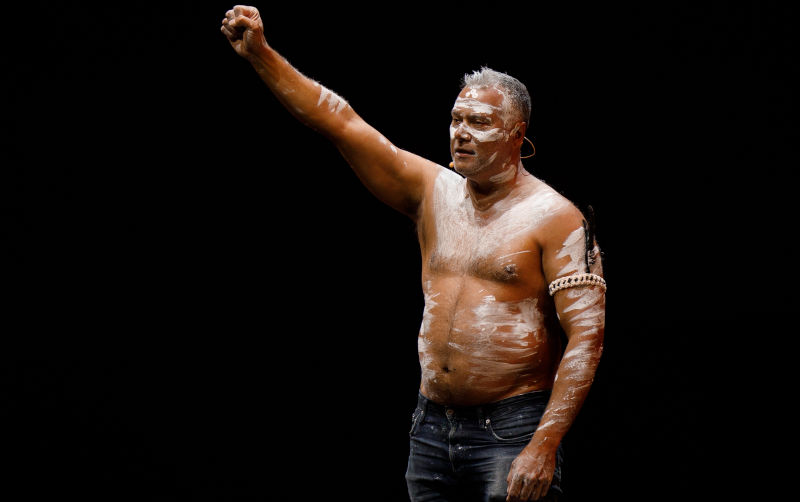 Stan Grant participates in a 'Reclaim' performance during The Vigil on the eve of Australia Day at Barangaroo Reserve, Sydney, Monday, January 25, 2021. Image: AAP /Paul Braven