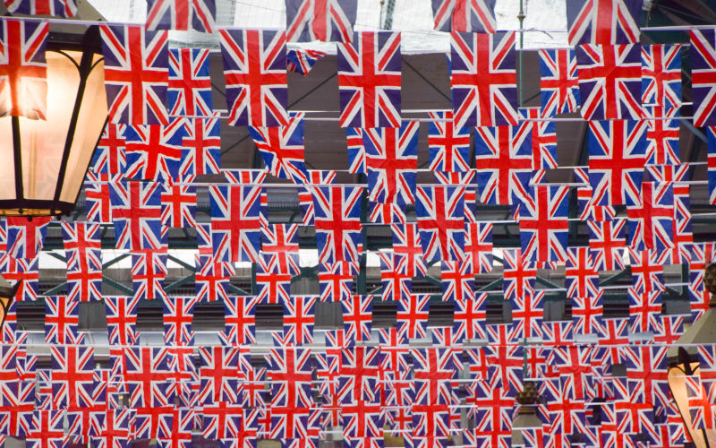 London, UK - April 14 2023: Thousands of Union Jacks decorate Covent Garden Market ahead of the coronation of King Charles III.