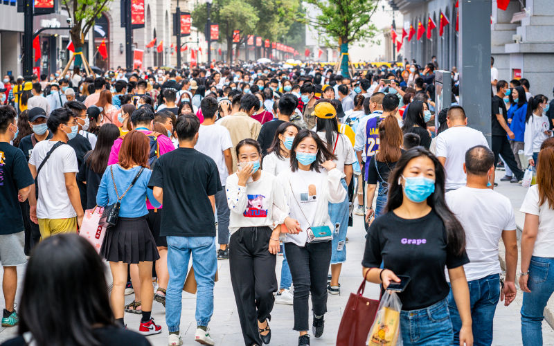 Wuhan China , 1 October 2020 : Crowd of people wearing surgical face mask