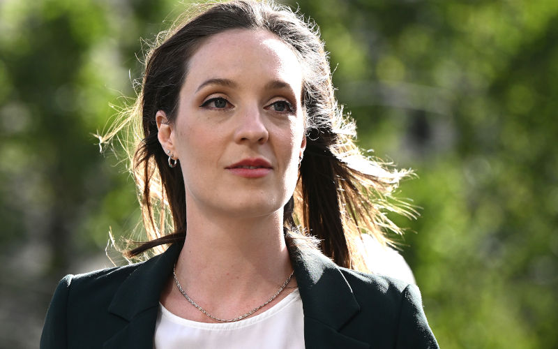 Sally Rugg arrives at the Federal Court of Australia in Melbourne, Friday, February 17, 2023. Political staffer Sally Rugg has filed a lawsuit against federal teal MP Monique Ryan for unfair dismissal, alleging 