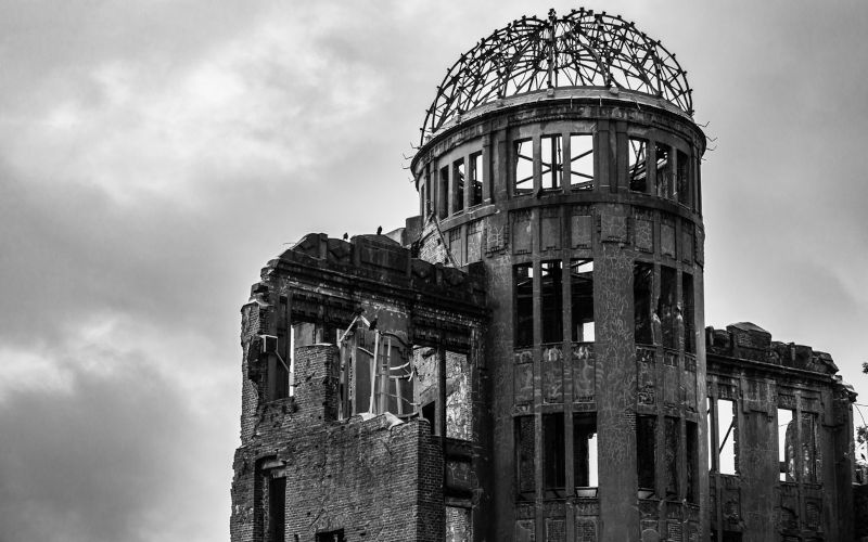 The view of Atomic Bomb Dome or Genbaku Dome at Hiroshima Peace Memorial Park in Hiroshima Japan against a cloudy sky