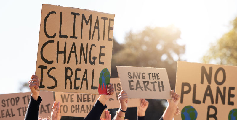 Shot of a group of people protesting Climate Change.