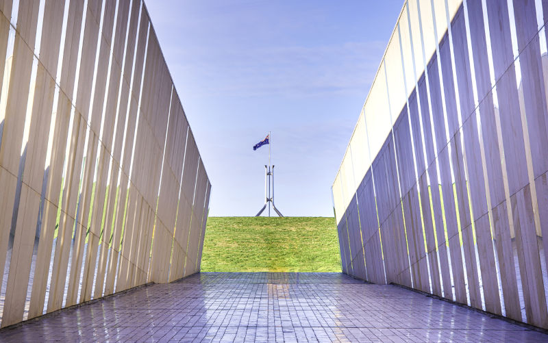 Canberra Parliament House in Sunrise at Lake Burley Griffin.