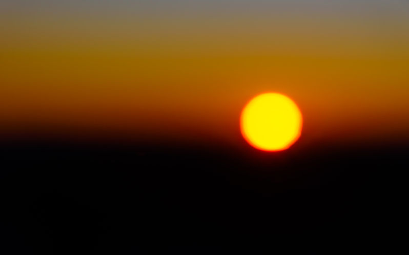 Sun set reminiscent of the iconic Australian Aboriginal flag.