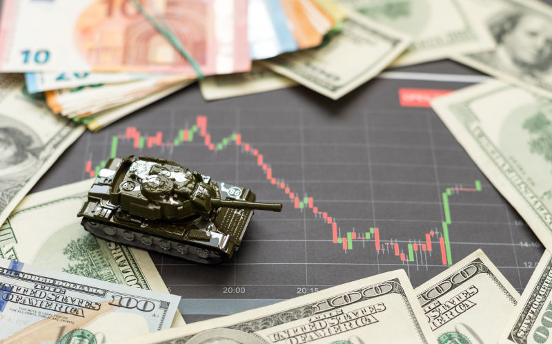 Toy-tank-and-dollars. Image: iStock / Sinenkiy Toy tank and dollars.